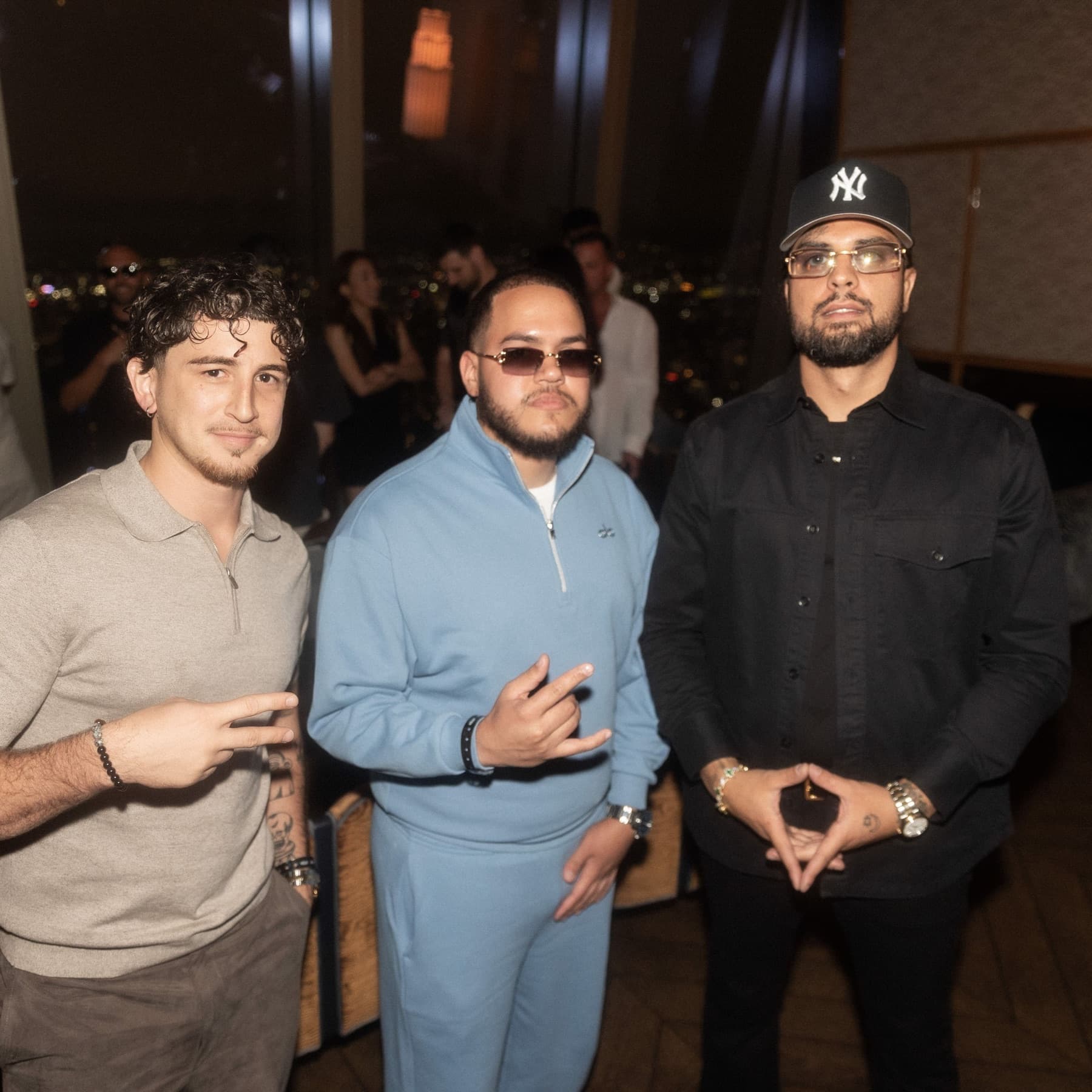 Rafael Reyes (Raf / Rafmeta) with Anthony Rivera (Riv) and David Chaboki (Shibo) at a DDNYC 2026 rooftop in New York